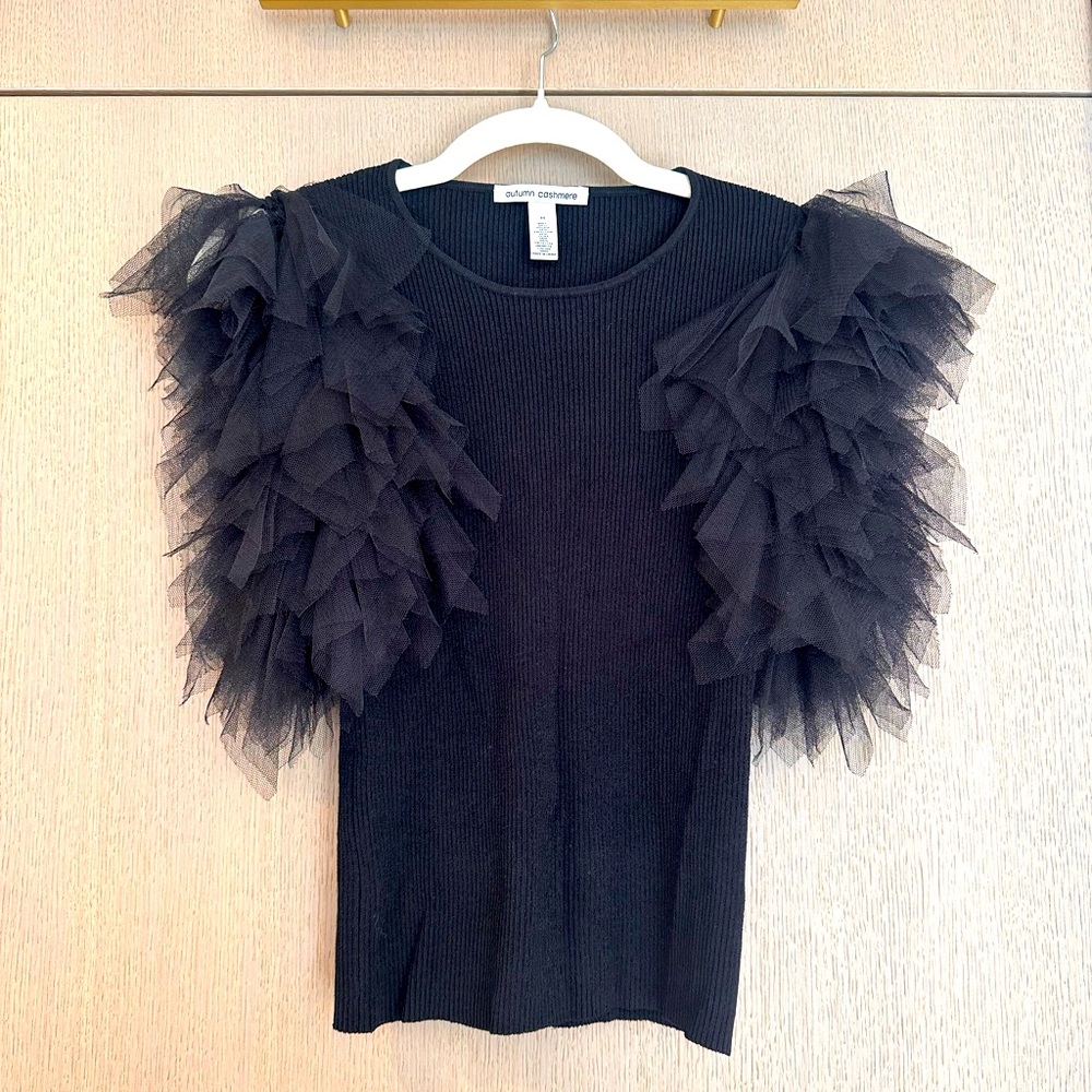 Black ruffled sleeveless top